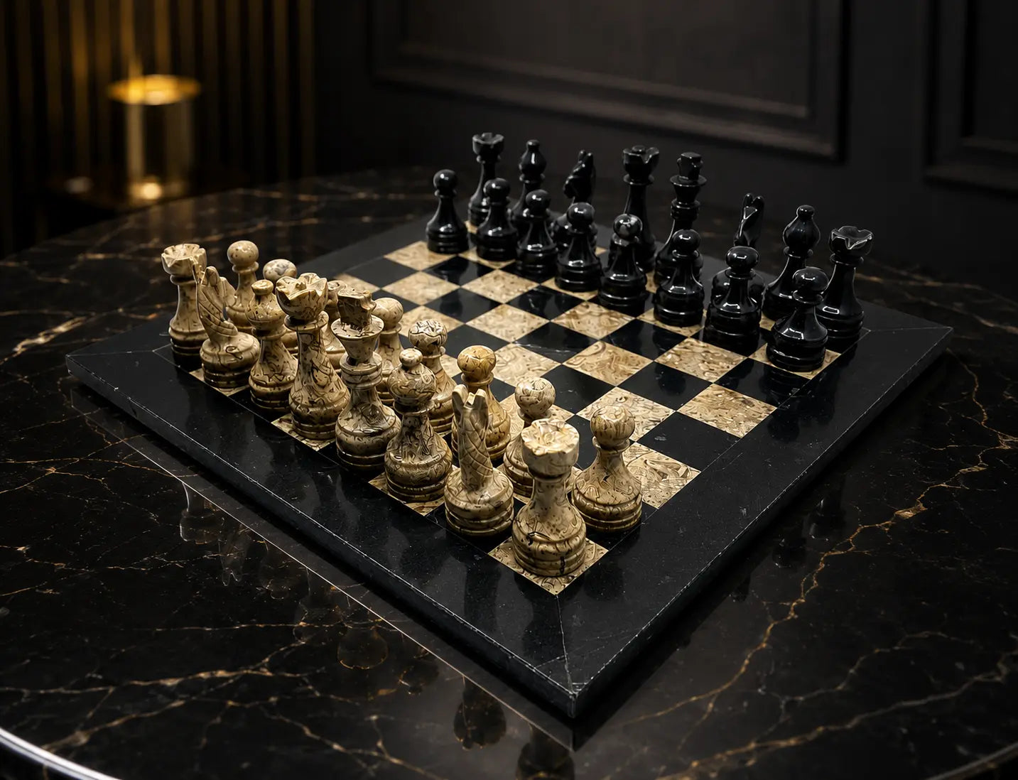 A luxury black and gold marble chess set displayed on a polished black marble table in an elegant room setting.