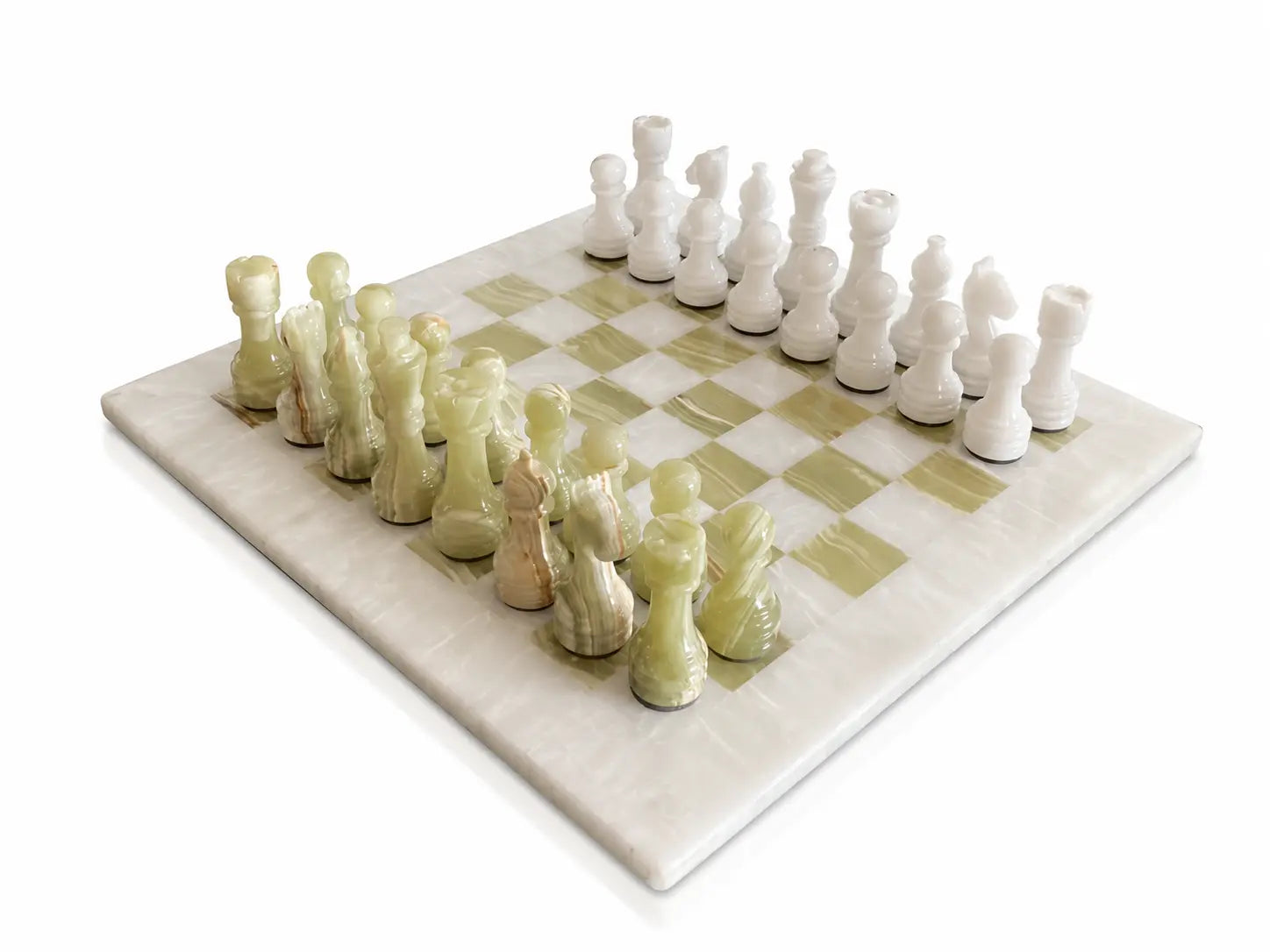 A marble chess set with a cream and pale green checkered board and sculptural chess pieces, photographed on a clean white background.
