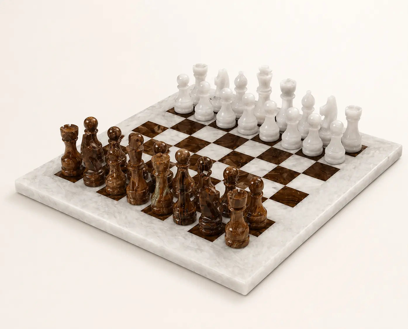 A polished marble chess set on a light cream marble board, featuring white and dark brown carved chess pieces on a clean white background.